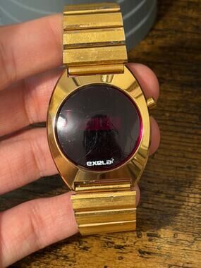 Exelar by National Semiconductor 1970s Red LED Digital Gold Tone Watch